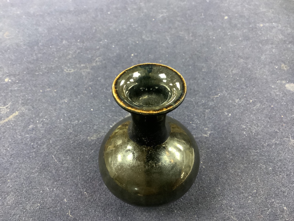 A Chinese blackware ribbed jar, a small blackware vase and a russet and black glazed jar, Yuan dynasty or later